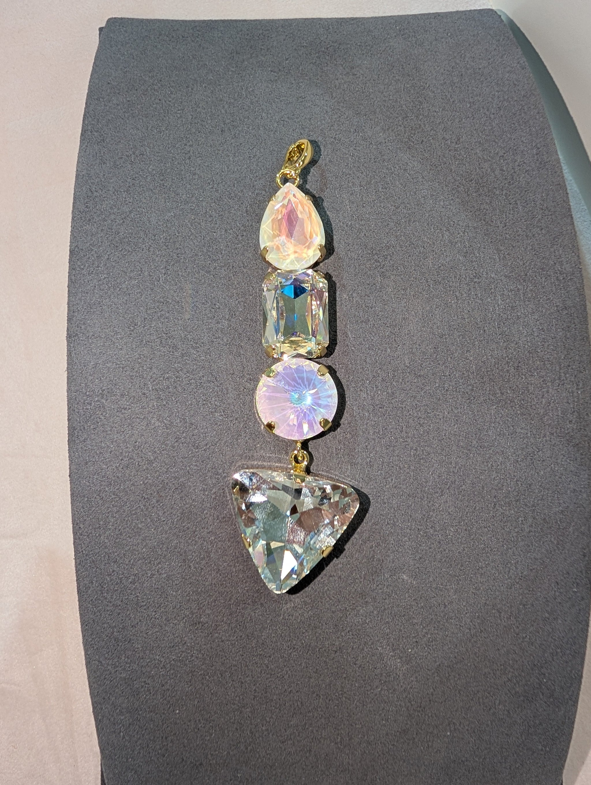 Wafa 4 Stone Charm Aurora - stacked pendant with blush pink opal teardrop, clear AB emerald cut, pink opal round, and aqua clear triangle stones in gold settings