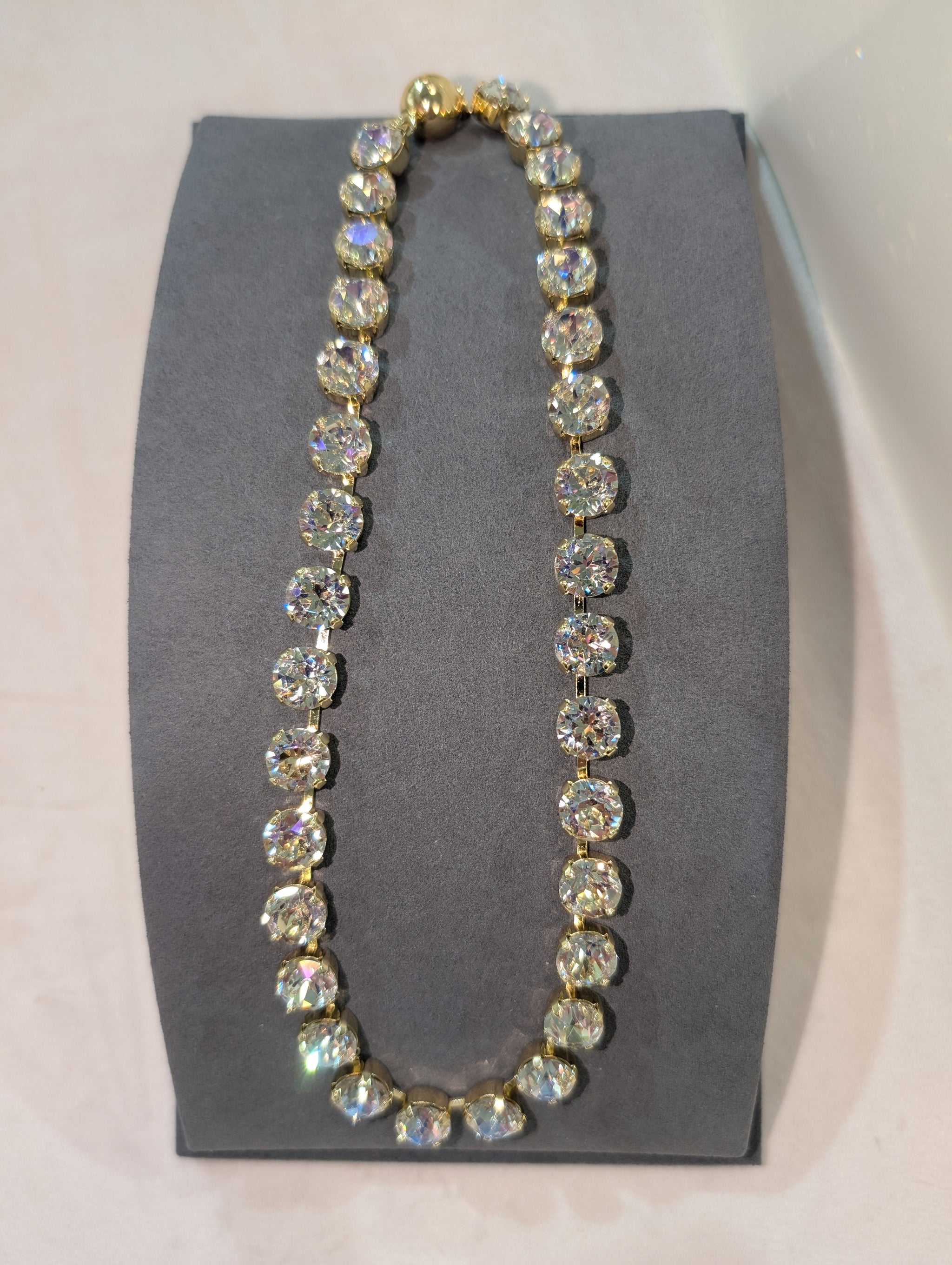 Wafa Crystal Necklace - full circle tennis necklace with large chunky round clear crystal stones in gold prong settings and gold magnetic ball clasp