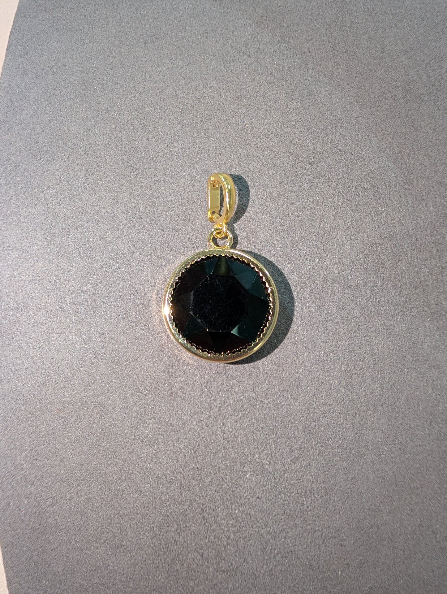 Wafa Round Crystal Charm in Jet Black - large faceted round black crystal in gold milgrain bezel setting with gold bail