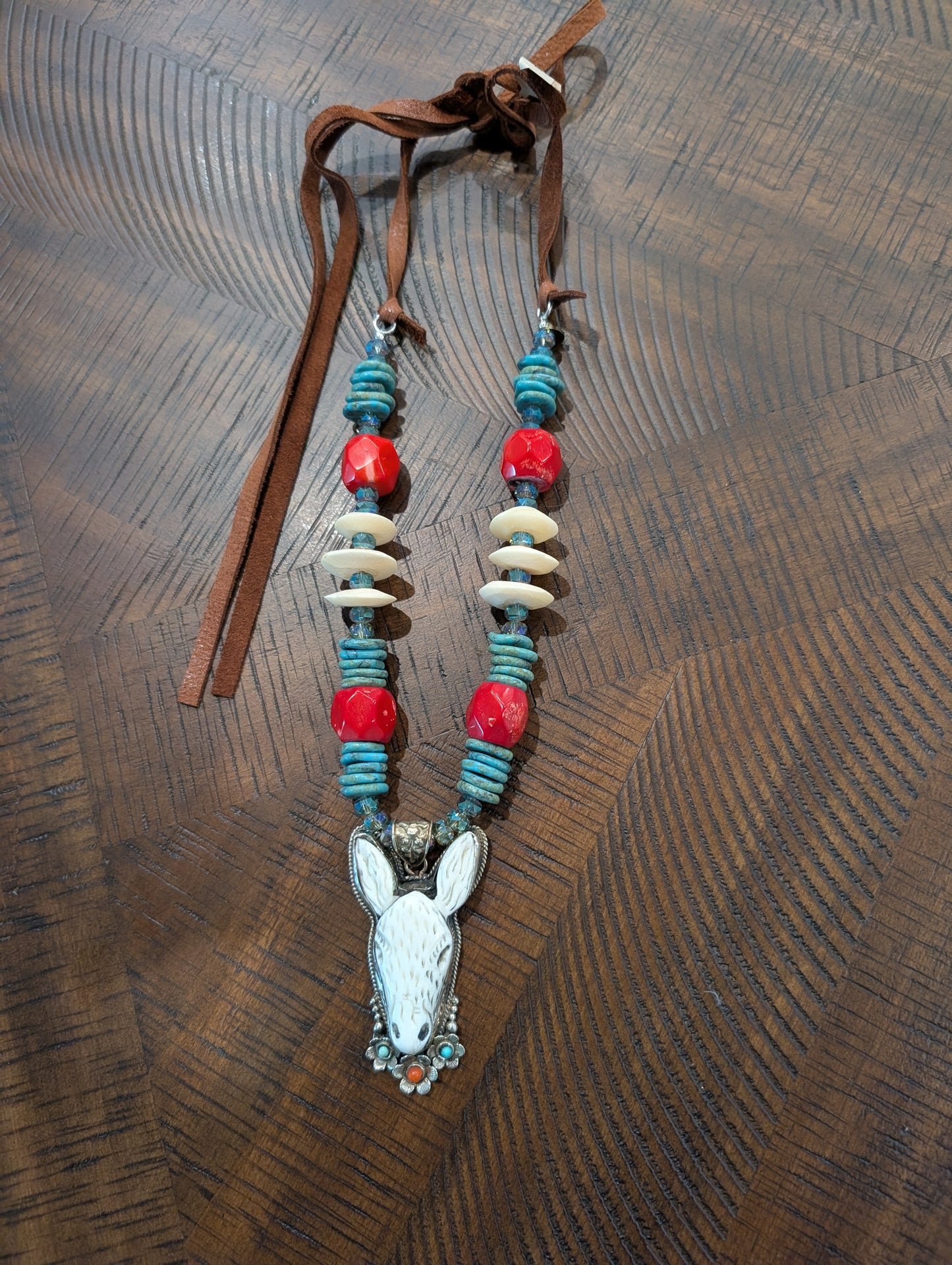 A Rare Bird Turquoise & Red Coral Horse Pendant Leather Tie Necklace