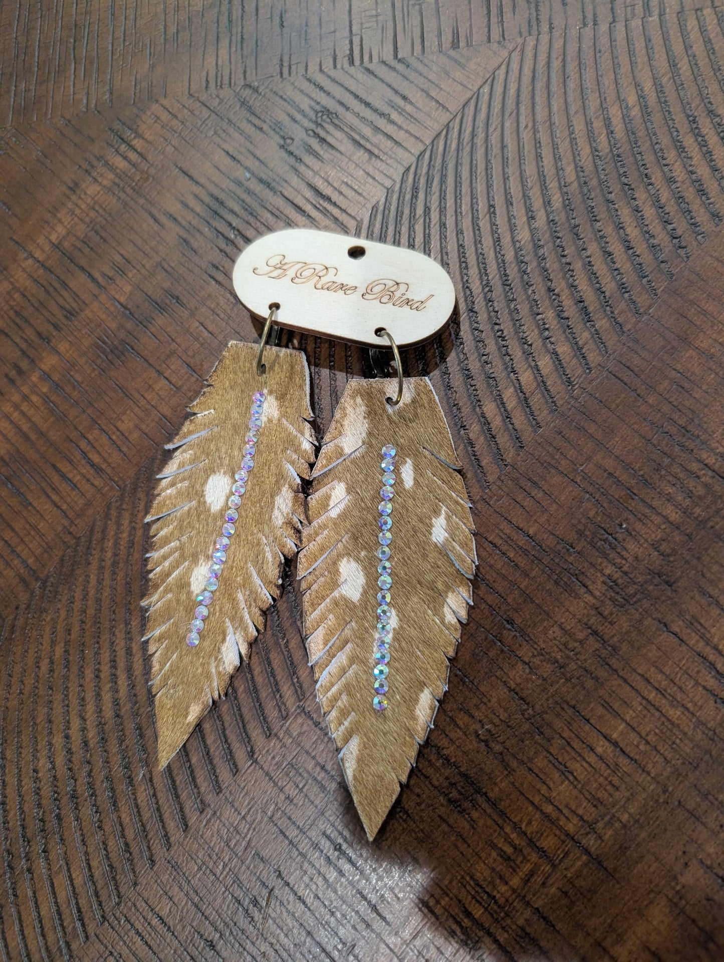 A Rare Bird Cowhide Feather Crystal Earrings - Tan Spotted