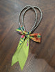 A Rare Bird Twilly Pearl Scarf Necklace in green floral
