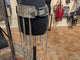 Kurtman Silver Metallic Fringe Corset Belt — styled front view showing silver fringe and buckle