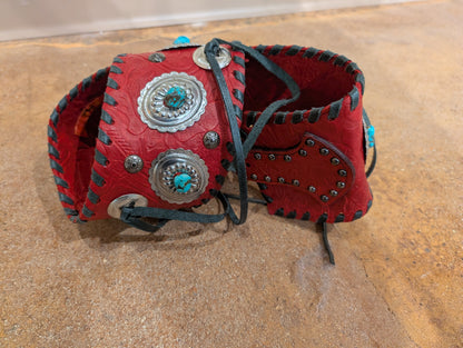 Kurtman Red Tooled Concho Corset Belt — back detail showing full concho layout and black whipstitch