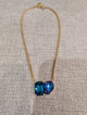 Pre Order WaFa Dual Crystal Pendant Necklace — blue: deep teal emerald-cut and violet-blue teardrop on gold chain