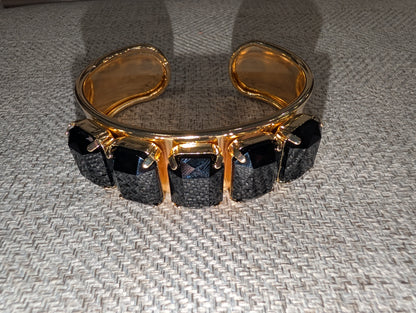 Pre Order WaFa 5-Stone Crystal Cuff Bracelet — black: five jet black cushion-cut crystals in gold prong settings on wide gold cuff