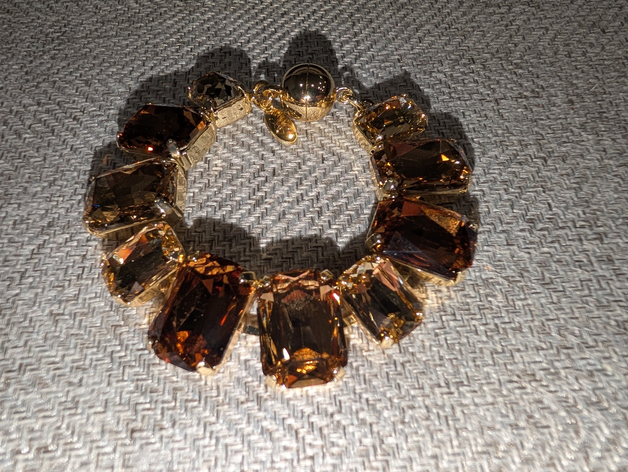 Pre Order WaFa Smoky Topaz Emerald-Cut Crystal Bracelet — oversized smoky cognac topaz emerald-cut crystals in gold bezel settings all the way around with gold ball clasp