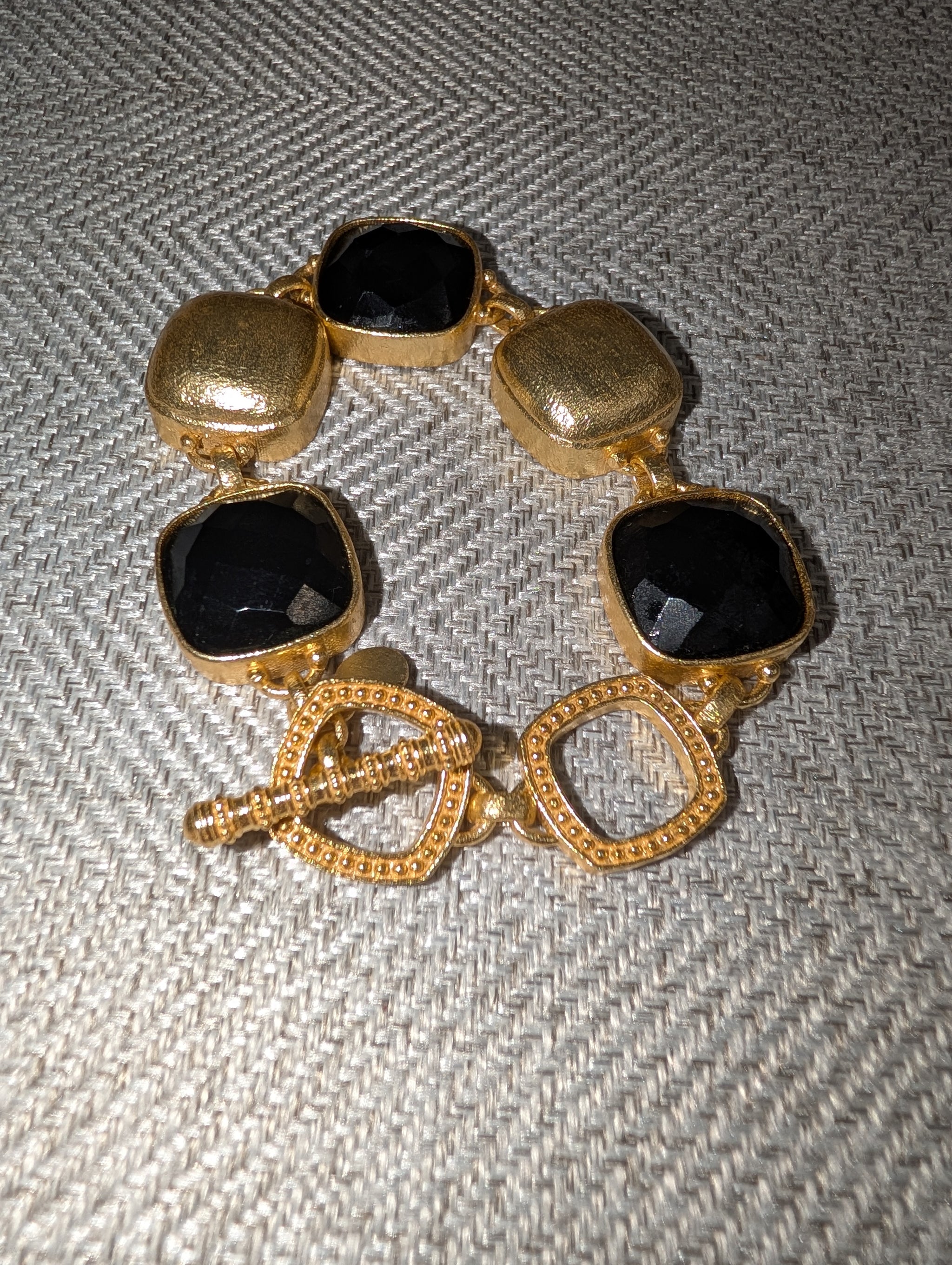 Pre Order WaFa Black Cushion Crystal Hammered Gold Toggle Bracelet — oversized faceted black cushion-cut crystals in hammered gold bezel settings with decorative gold beaded toggle clasp