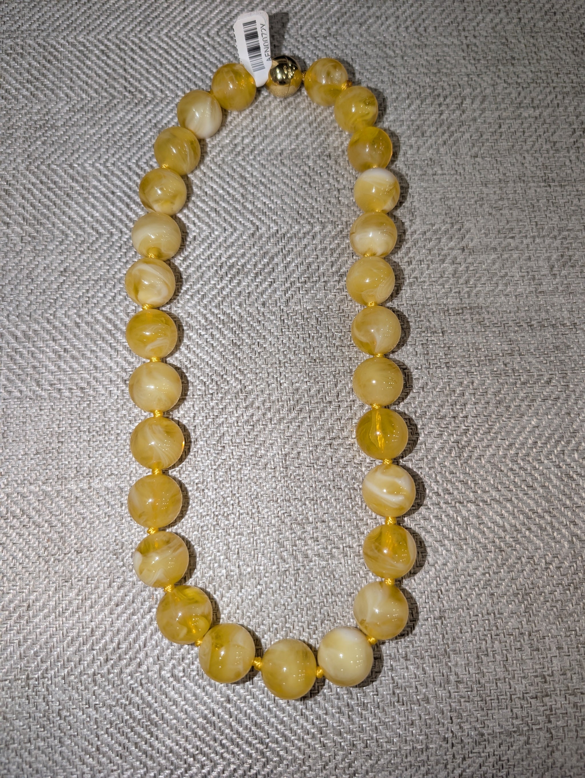 Pre Order WaFa Marbled Resin Bead Necklace — yellow: oversized marbled cream and golden yellow resin round beads knotted on gold cord with gold magnetic ball clasp
