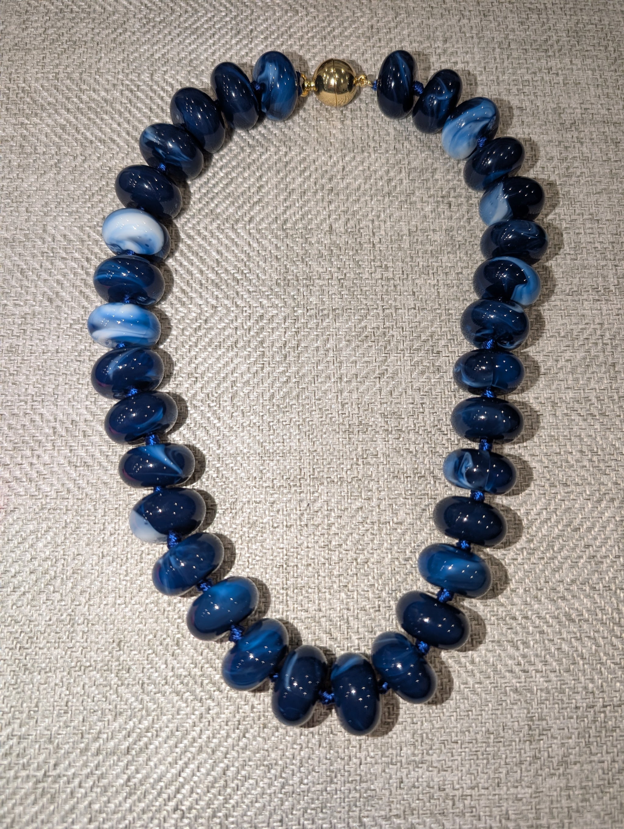 Pre Order WaFa Navy Blue Marbled Rondelle Bead Necklace — oversized deep navy blue and white marbled rondelle resin beads hand-knotted on blue cord with gold magnetic ball clasp