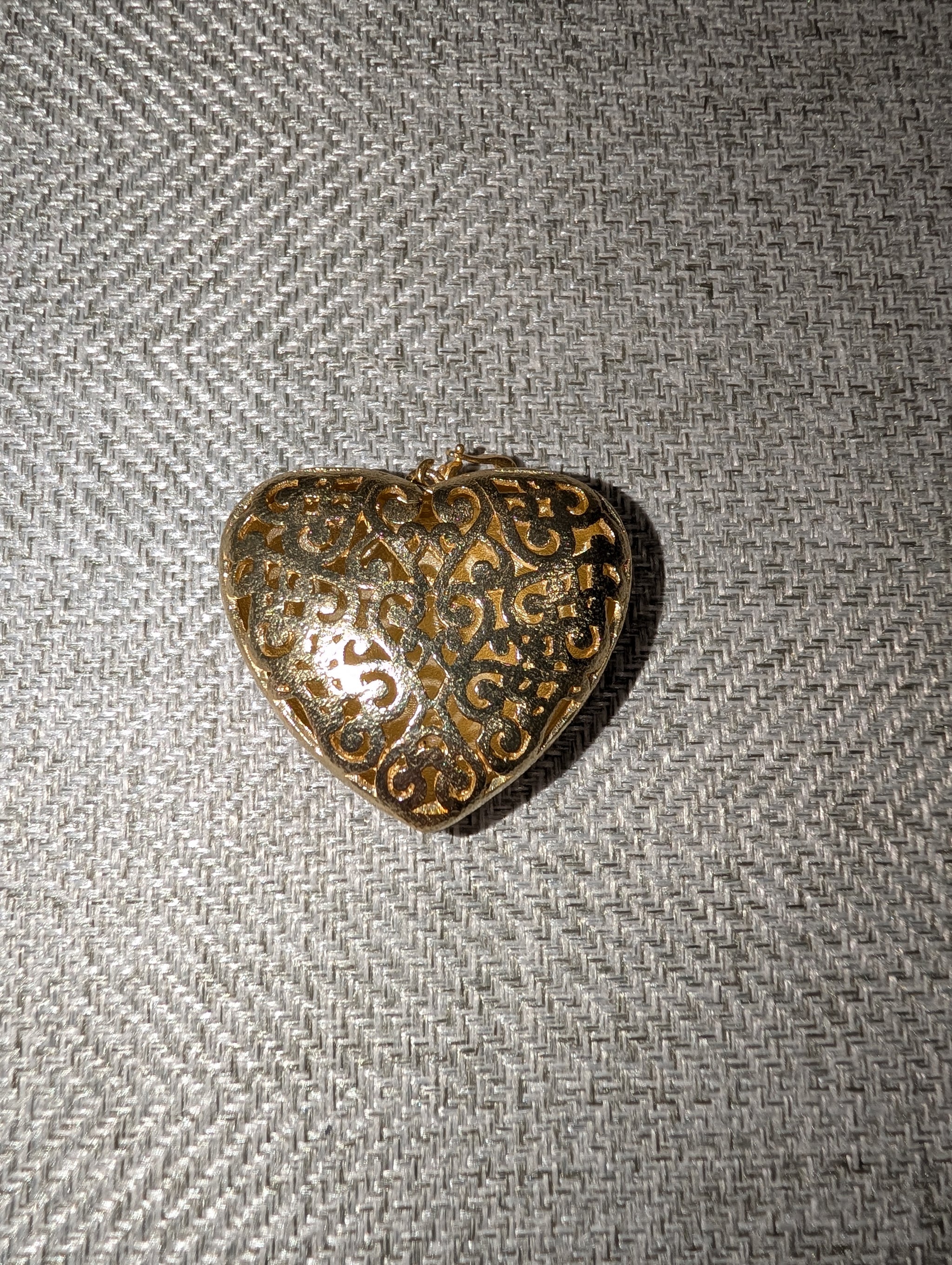 Pre Order WaFa Puffy Gold Scrollwork Heart Pendant — front: large puffy gold heart with intricate black-accented scrollwork and filigree engraving