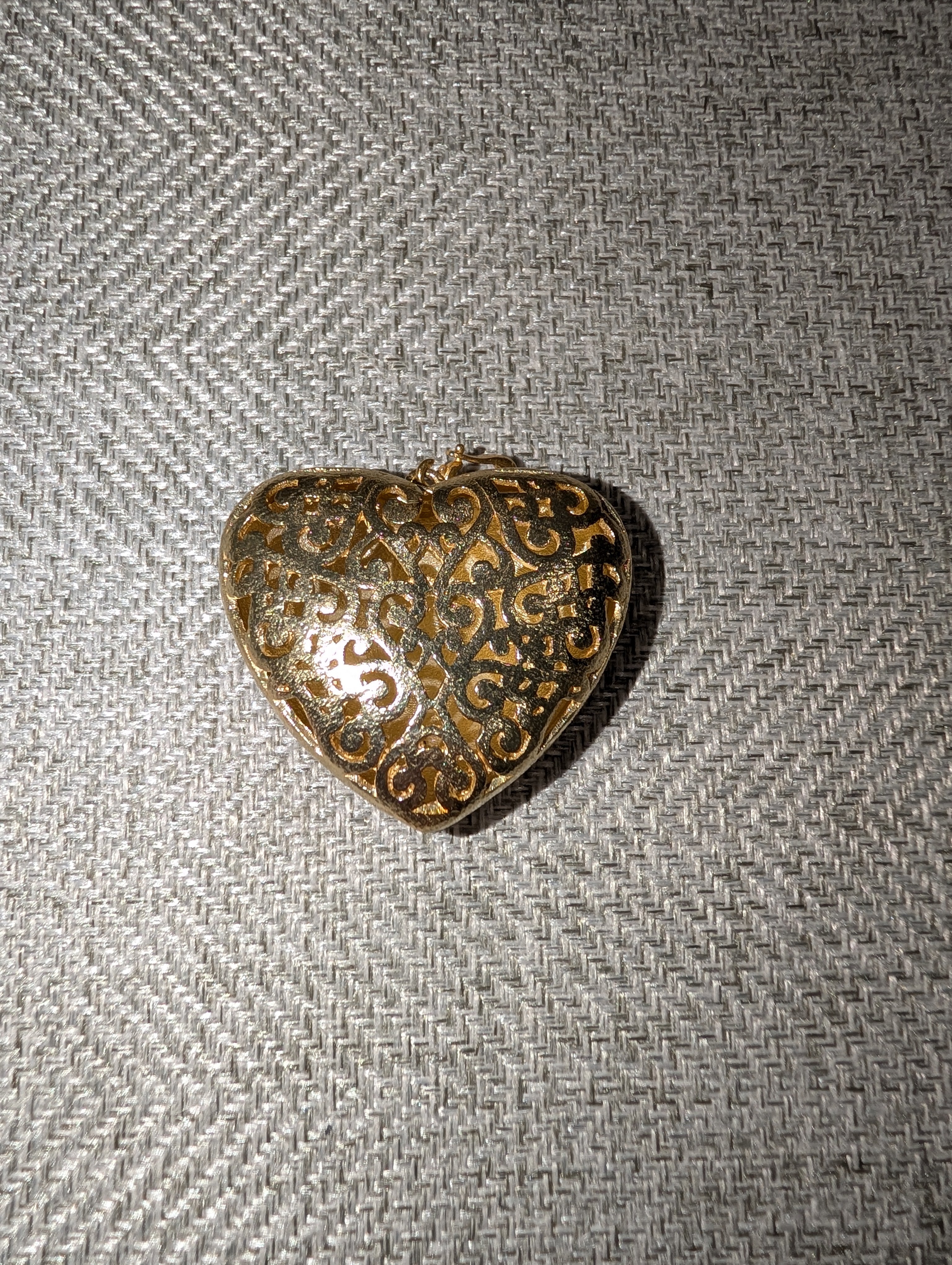 Pre Order WaFa Puffy Gold Scrollwork Heart Pendant — front: large puffy gold heart with intricate black-accented scrollwork and filigree engraving