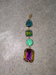 Pre Order WaFa 4-Stone Mixed-Cut Crystal Drop Pendant — jewel: teal teardrop, green AB cushion, mint round rivoli, and volcano rectangle emerald-cut crystals linked vertically in gold prong settings with gold bail