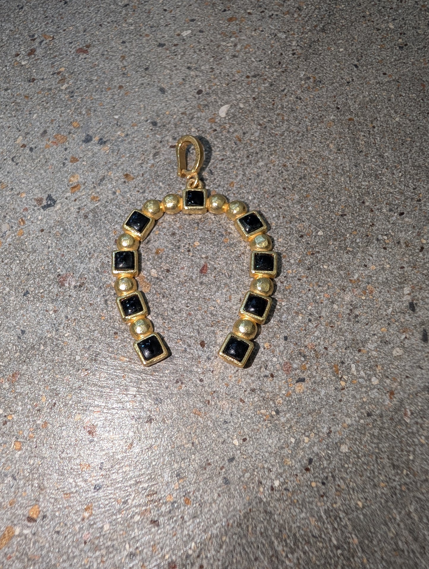 Pre Order WaFa Black Onyx Horseshoe Pendant — horseshoe-shaped pendant with alternating black onyx square cabochons in gold bezel settings and polished gold ball beads, finished with a gold bail