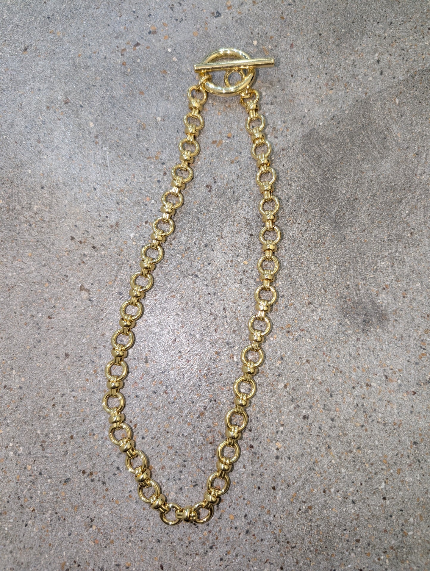 Pre Order WaFa Chunky Gold Circle Link Toggle Necklace — chunky polished gold round circle links connected by textured barrel connectors with a decorative gold toggle clasp