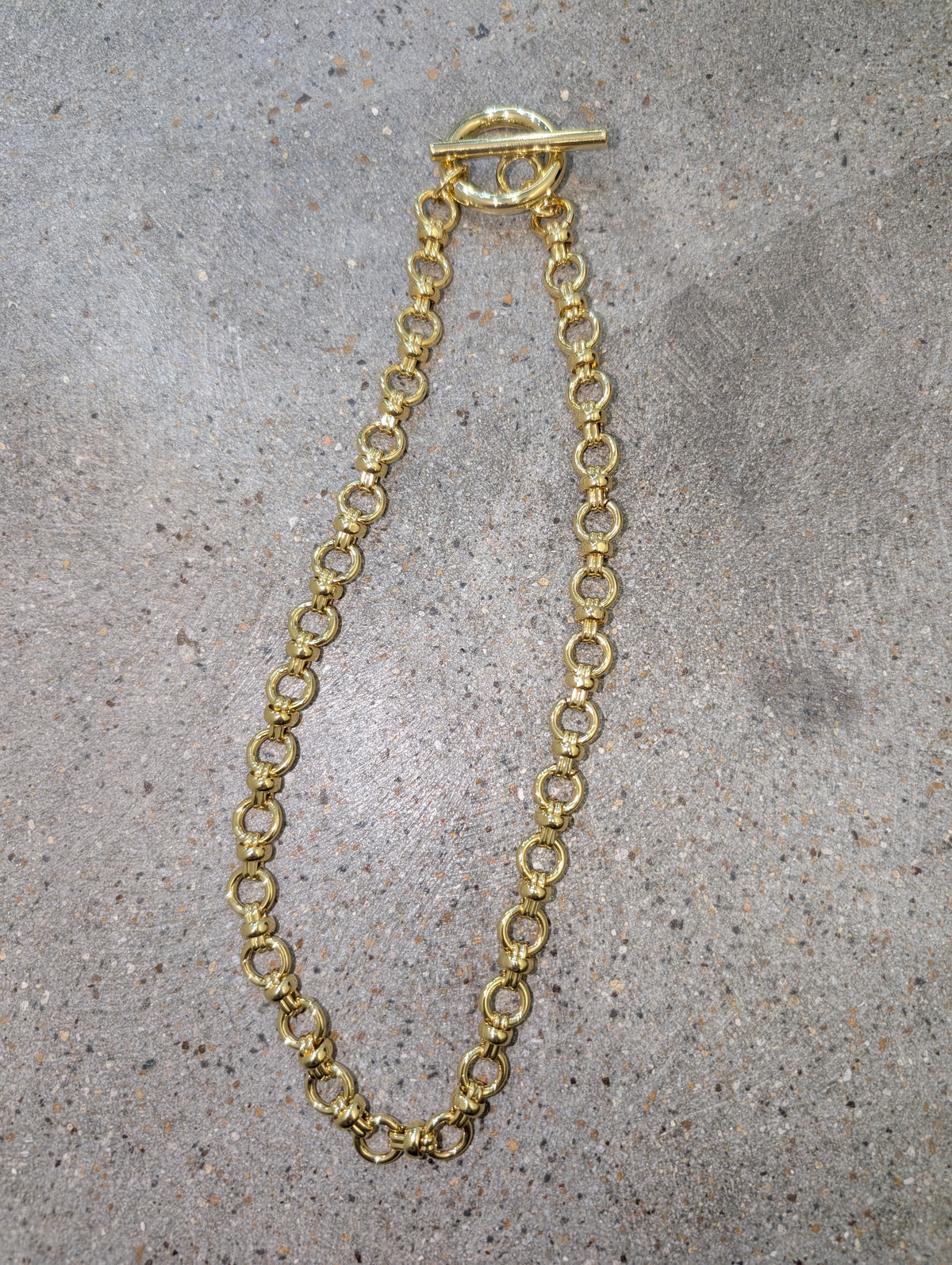 Pre Order WaFa Chunky Gold Circle Link Toggle Necklace — chunky polished gold round circle links connected by textured barrel connectors with a decorative gold toggle clasp