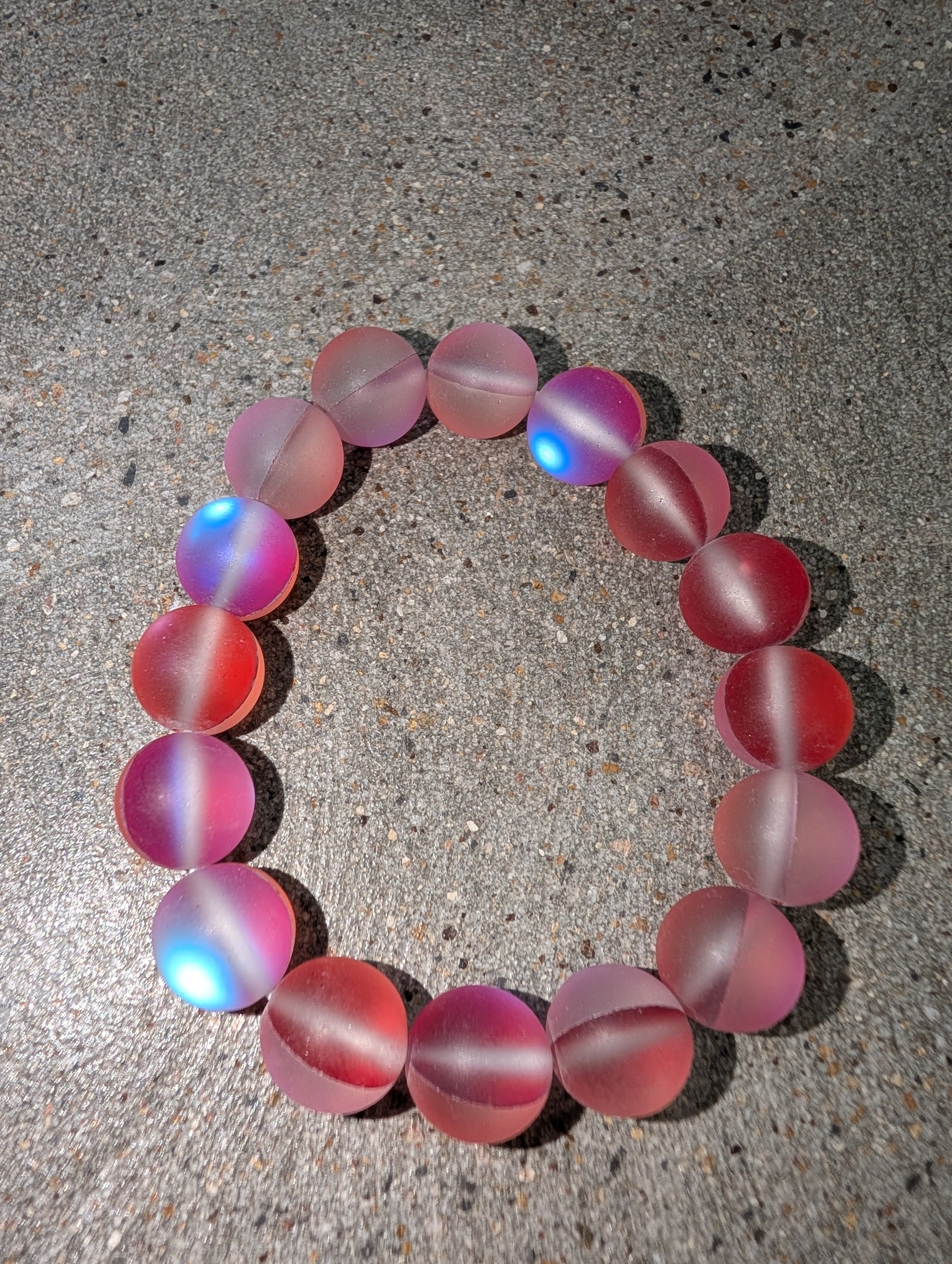 Pre Order WaFa Frosted Mermaid Glass Bead Stretch Bracelet — pink/red: oversized frosted blush pink and deep red round mermaid glass beads with blue aurora iridescent flash on stretch cord