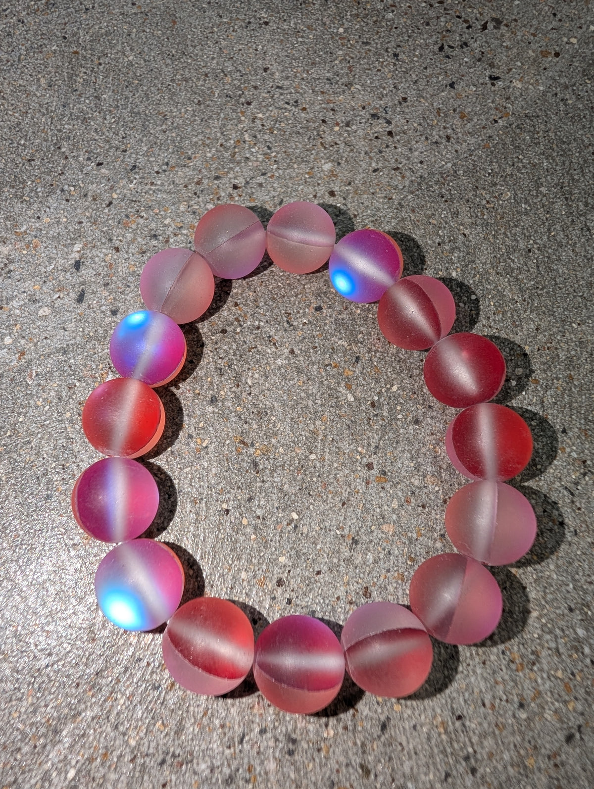 Pre Order WaFa Frosted Mermaid Glass Bead Stretch Bracelet — pink/red: oversized frosted blush pink and deep red round mermaid glass beads with blue aurora iridescent flash on stretch cord