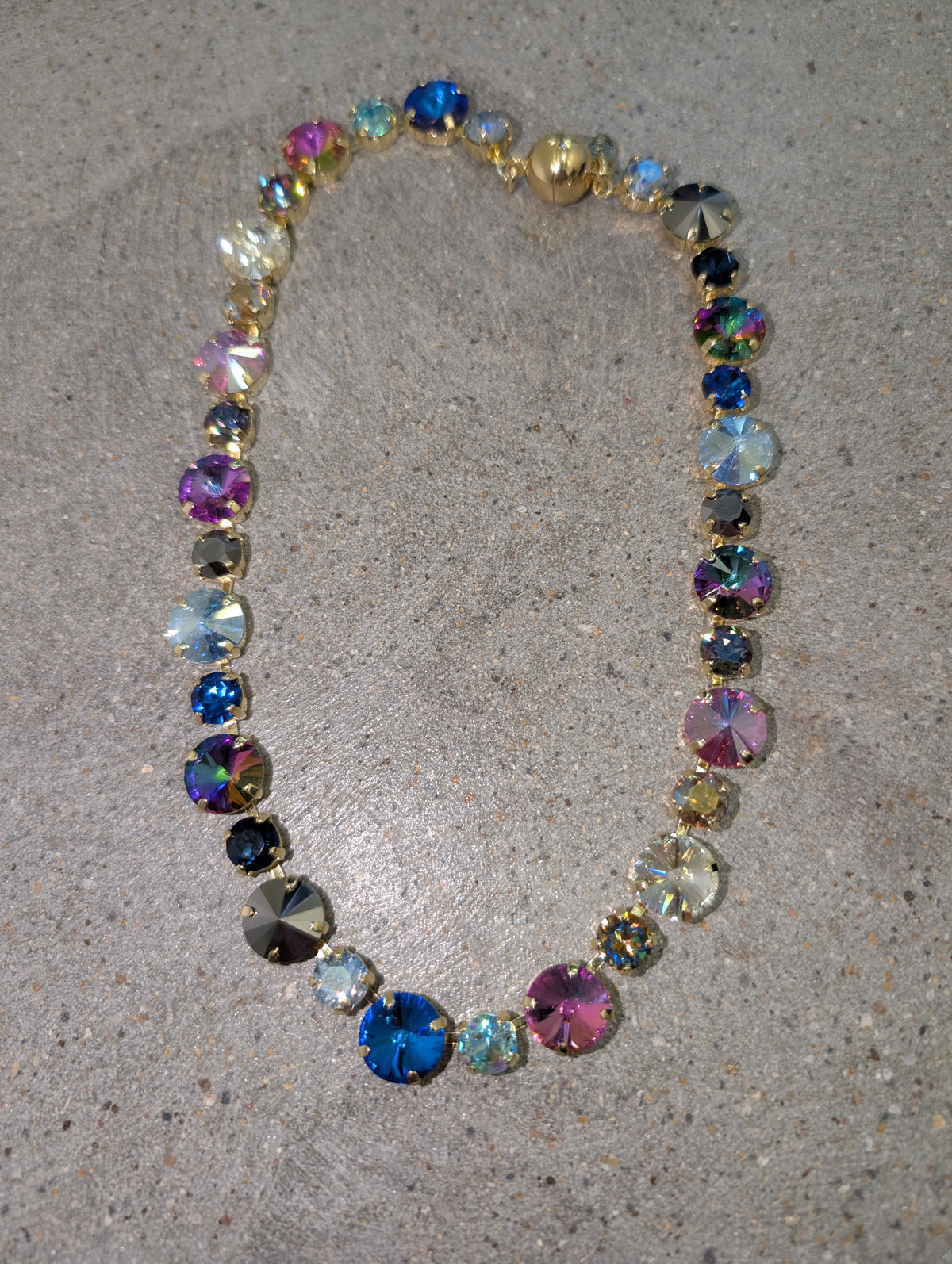 Pre Order WaFa Rainbow Rivoli Crystal Statement Necklace — full strand of mixed-size round rivoli crystals in every color — blue, pink, purple, amethyst, grey, champagne, aurora, teal, and more — in individual gold prong cup settings with gold magnetic ball clasp