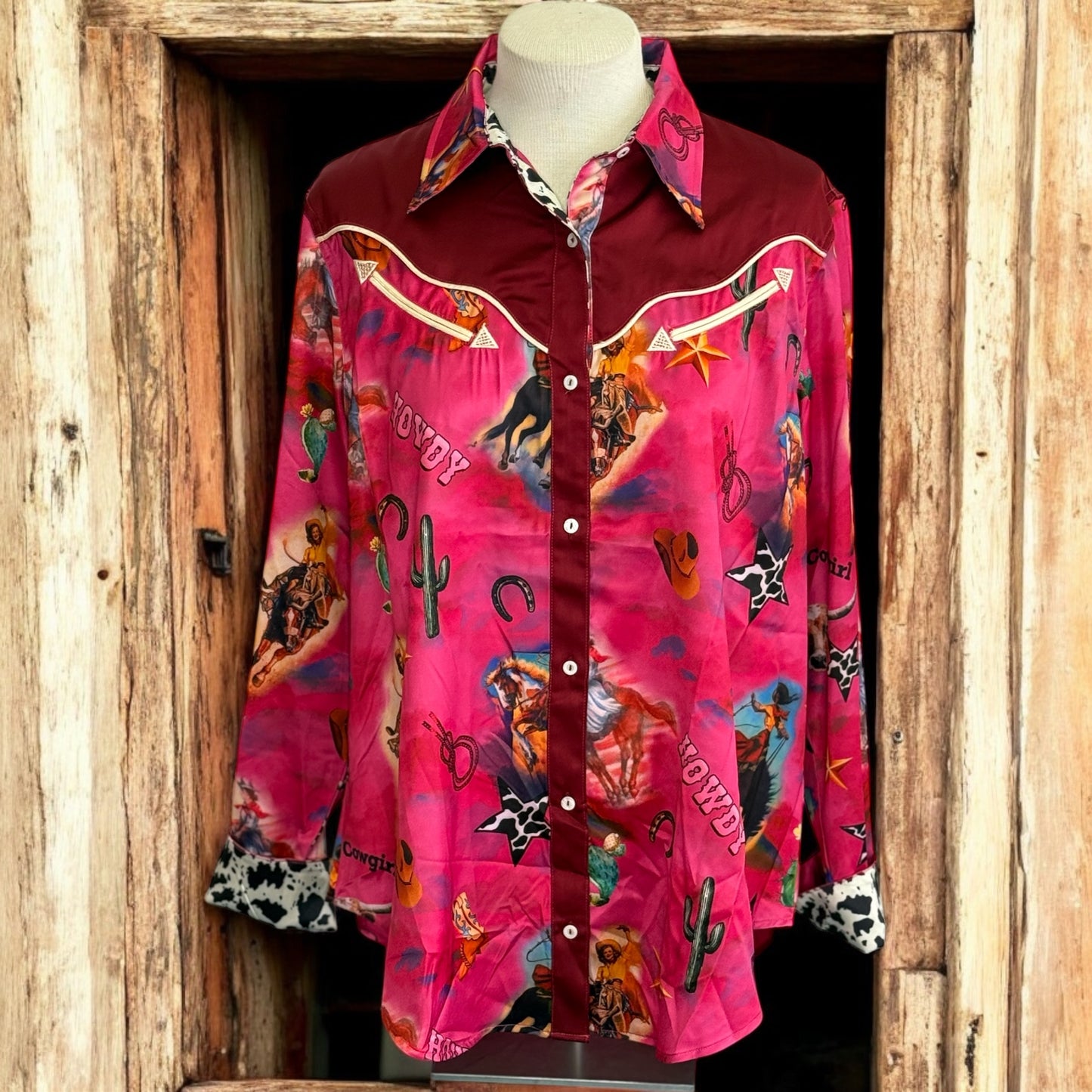 A Rare bird cowgirl satin button up blouse