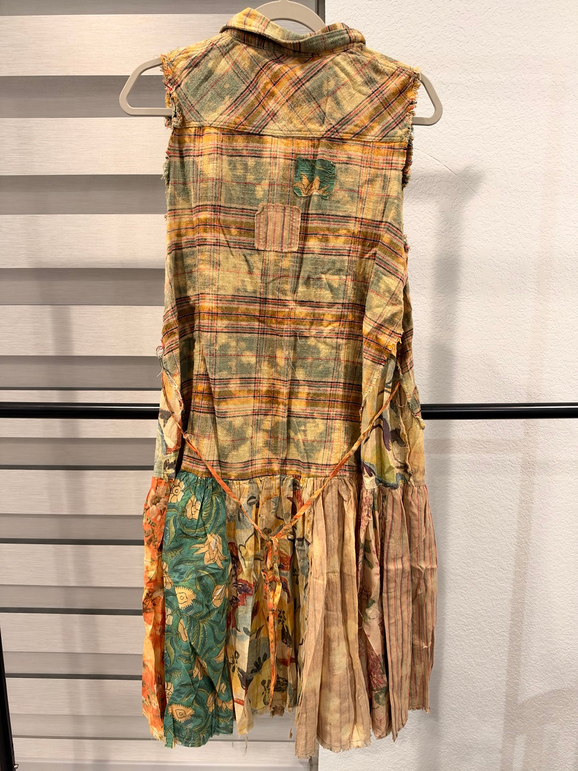 A Rare Bird sleeveless plaid patchwork dress with floral and striped panels, back view