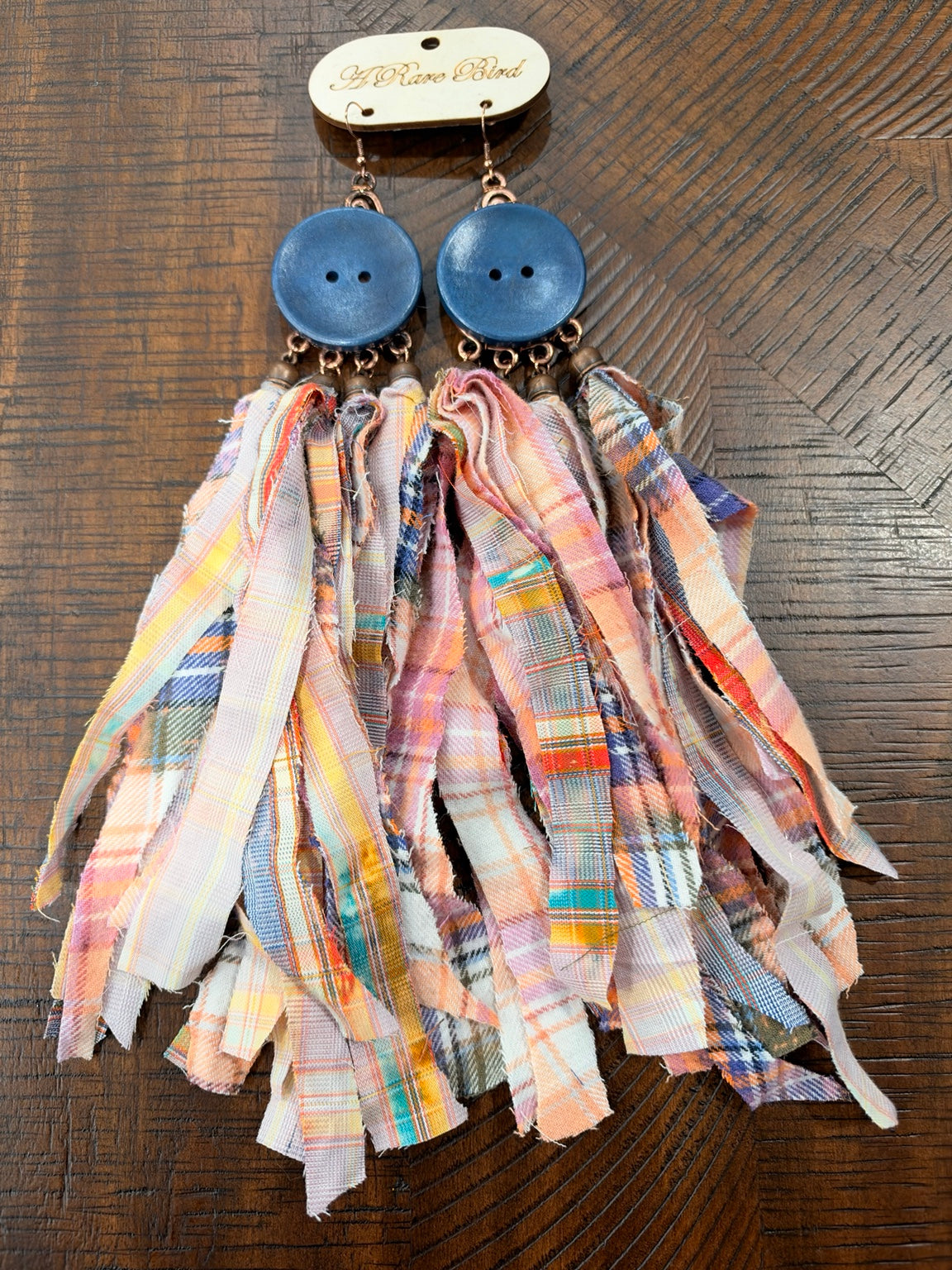 A Rare Bird button and fabric fringe earrings in Blue / Multicolor Plaid