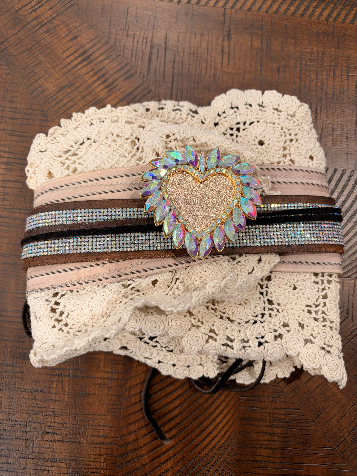 A Rare Bird ivory lace cuff with blush ribbon and sparkling gold-tone heart