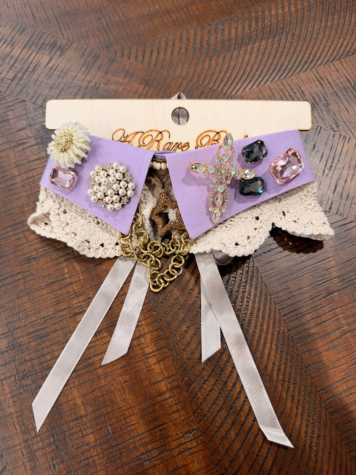 A Rare Bird one-of-a-kind embellished collar necklace, lavender with cross and pearl-look accents, cream crochet lace and gold-tone chain