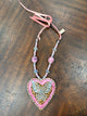 A Rare Bird pink and spotted heart pendant necklace with sparkling butterfly and pink beads