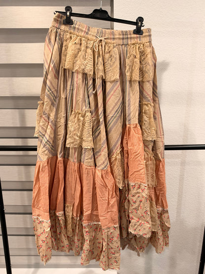 A Rare Bird Prairie Poetry patchwork skirt with muted stripes, peach panels, floral hem and cream lace, front