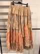 A Rare Bird Prairie Poetry patchwork skirt with muted stripes, peach panels, floral hem and cream lace, front