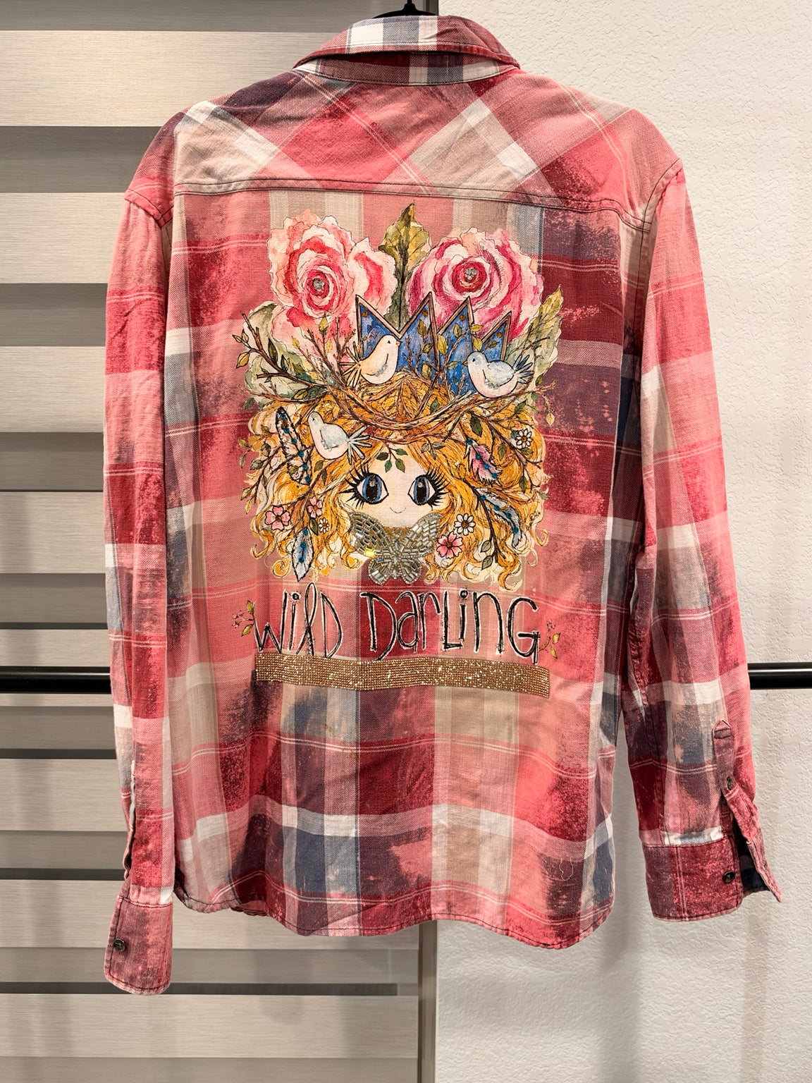 A Rare Bird Wild Darling Top in Coral Plaid, back with Wild Darling graphic