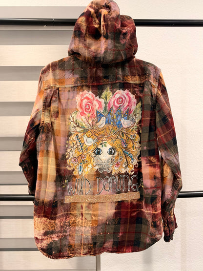 A Rare Bird Wild Darling rust hooded plaid top back graphic