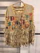 A Rare Bird striped patchwork vest with floral and plaid panels, frayed fringe, and front ties, front view