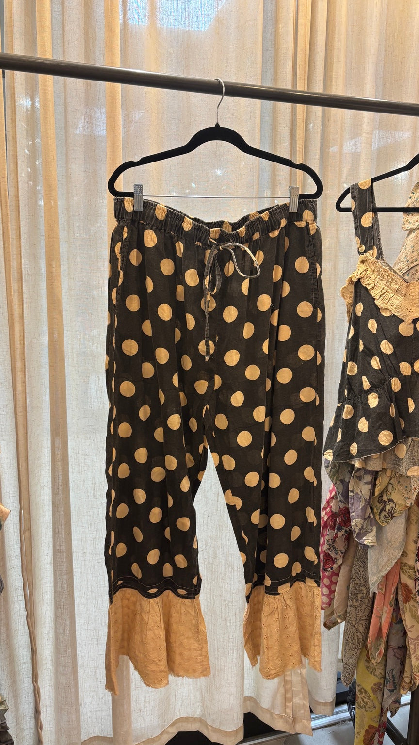 Jaded Gypsy Along The Way Pants in Dot with golden polka dots and eyelet ruffle hems