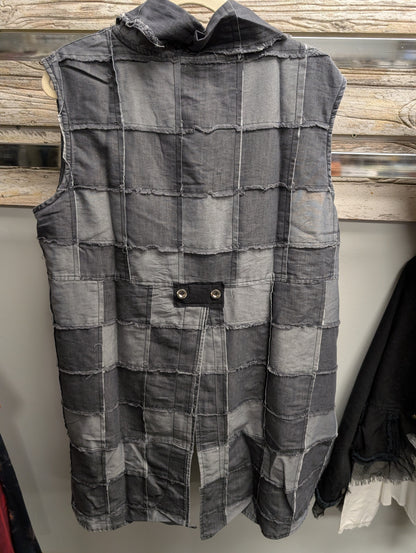 Back of Apothic Grey Patch long vest with exposed patchwork seams and two-button tab detail