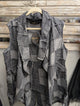 Apothic Grey Patch sleeveless vest with draped open front, frayed patchwork seams and front pockets