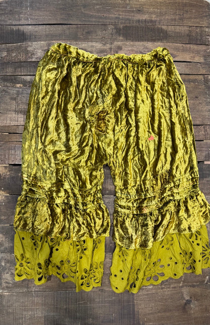 House of Jaded Gypsy chartreuse velvet-look pants with ruffles and floral eyelet hems, back