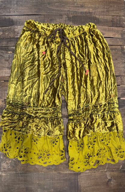 House of Jaded Gypsy chartreuse velvet-look pants with ruffles and floral eyelet hems, front