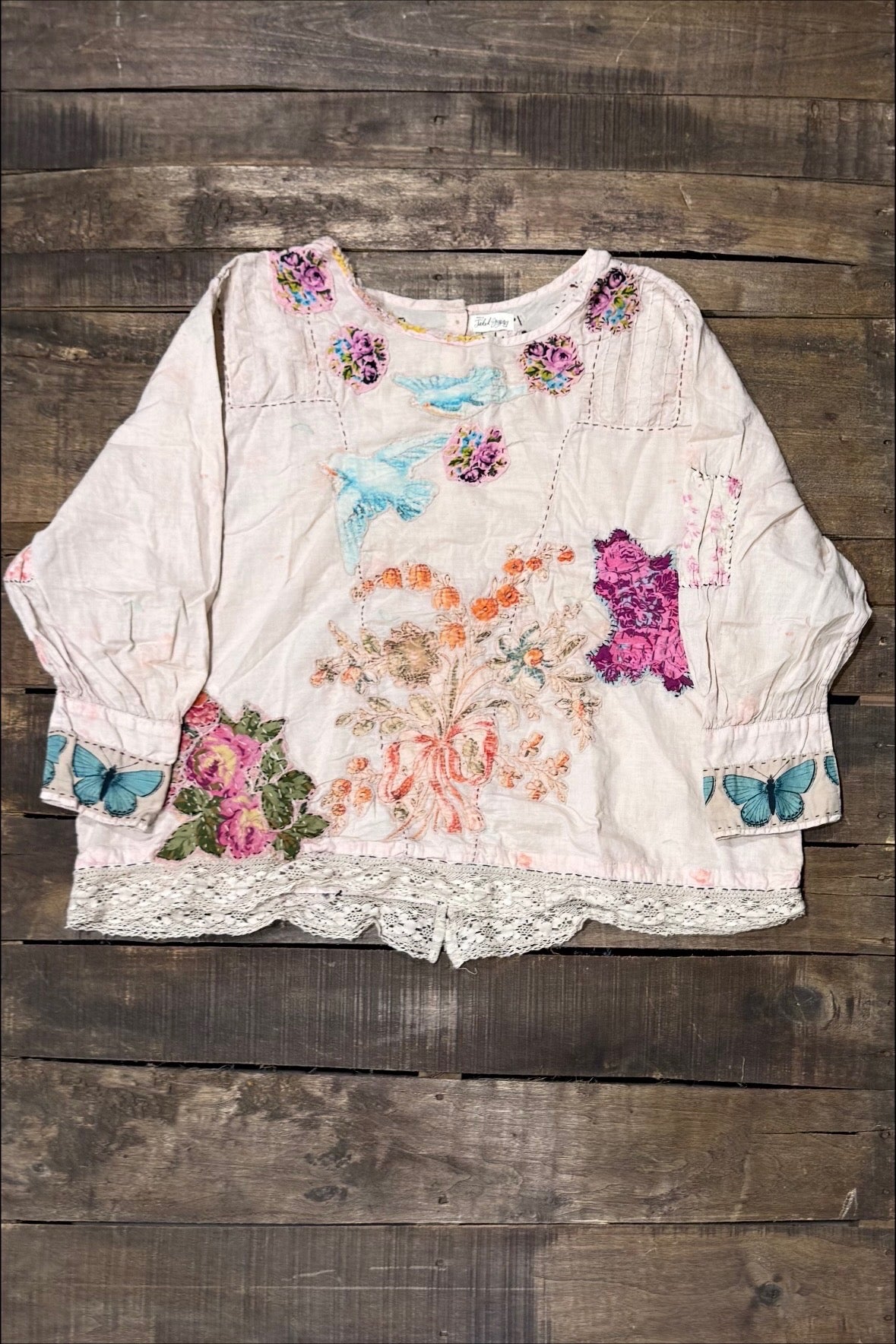 House of Jaded Gypsy Gilded Bloom Top Flutter with floral and blue bird motifs, butterfly cuffs and lace hem