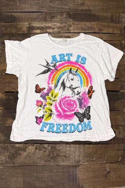House of Jaded Gypsy Weathered and Worn Tee Derby, white graphic tee with Art Is Freedom lettering, horse, rainbow, roses and butterflies