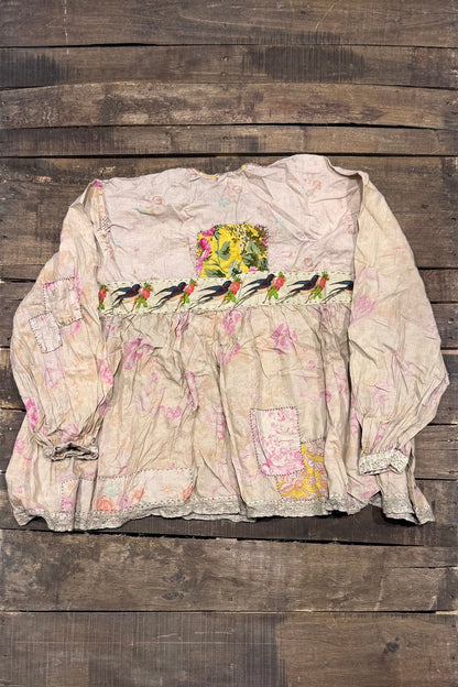 House of Jaded Gypsy Weathered Wildflower Top, back view with bird-and-flower band and floral patches