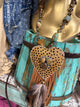 A Rare Bird Heart Necklace