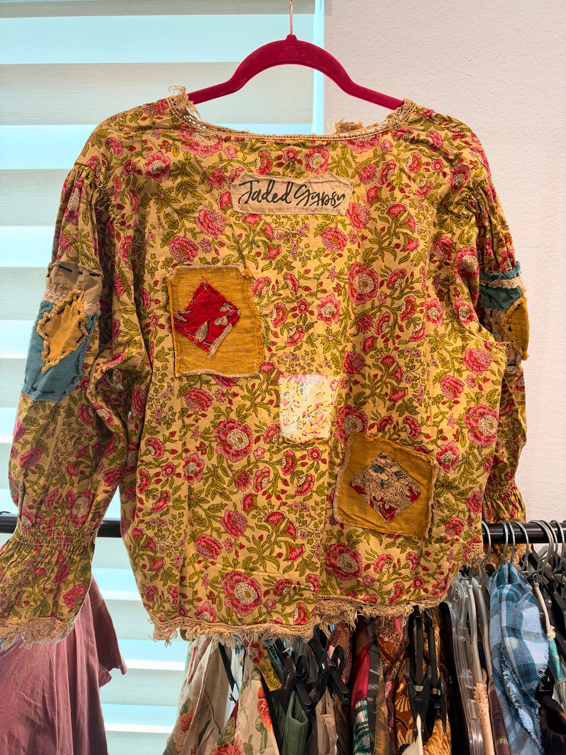 Jaded Gypsy Cheerful Walks floral patchwork wrap with distressed lace trim, back view
