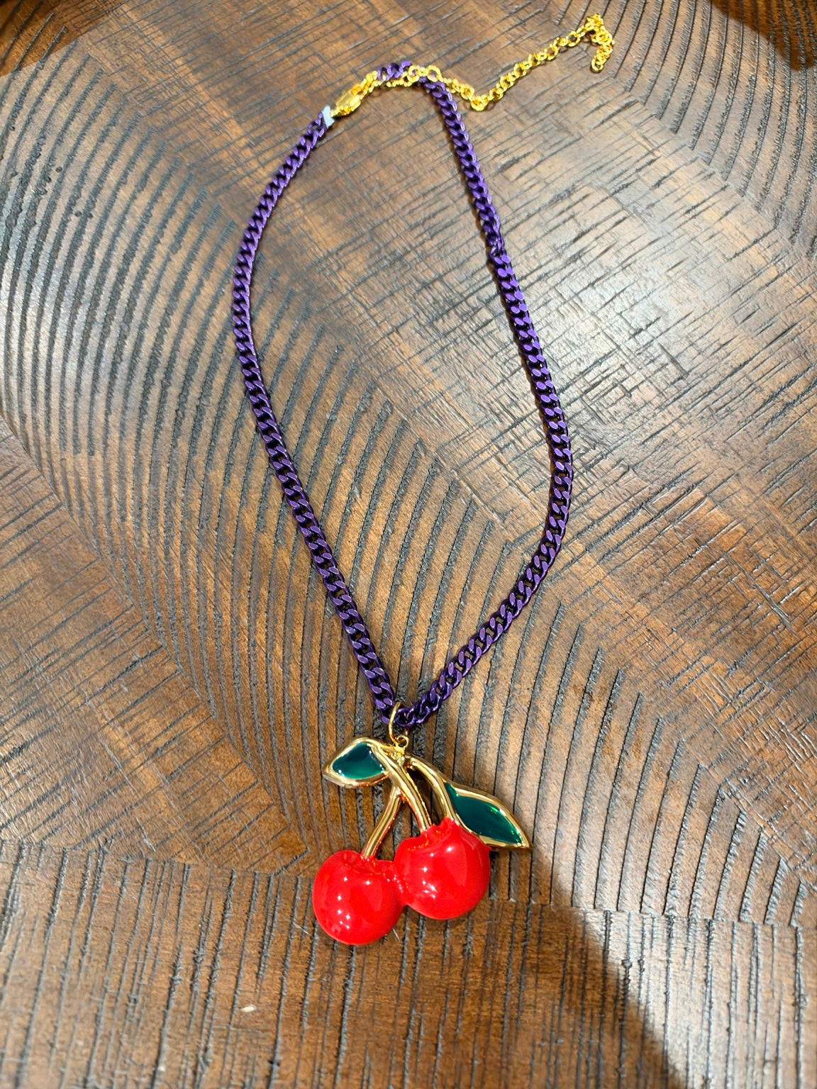 Jaded Gypsy red cherry pendant necklace with purple chain and gold-tone accents
