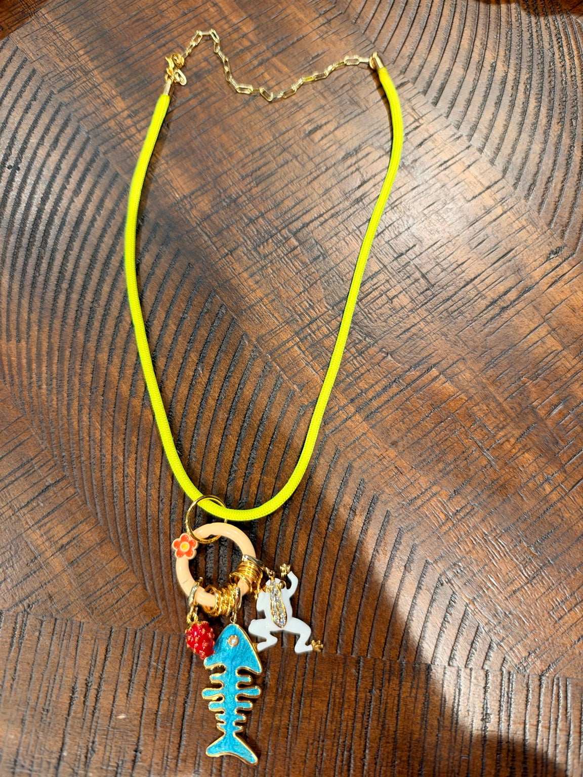 Jaded Gypsy neon yellow cord necklace with turquoise fishbone, white frog and colorful charms