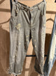 Jaded Gypsy Peace and Love Jeans in Midnight Railroad with narrow stripes, distressed patches and rolled cuffs
