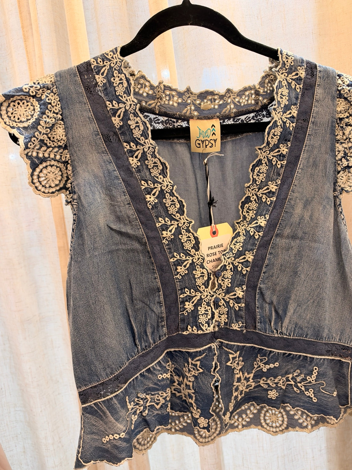Jaded Gypsy Prairie Rose Chambray Top with cream floral embroidery, scalloped cap sleeves and hem