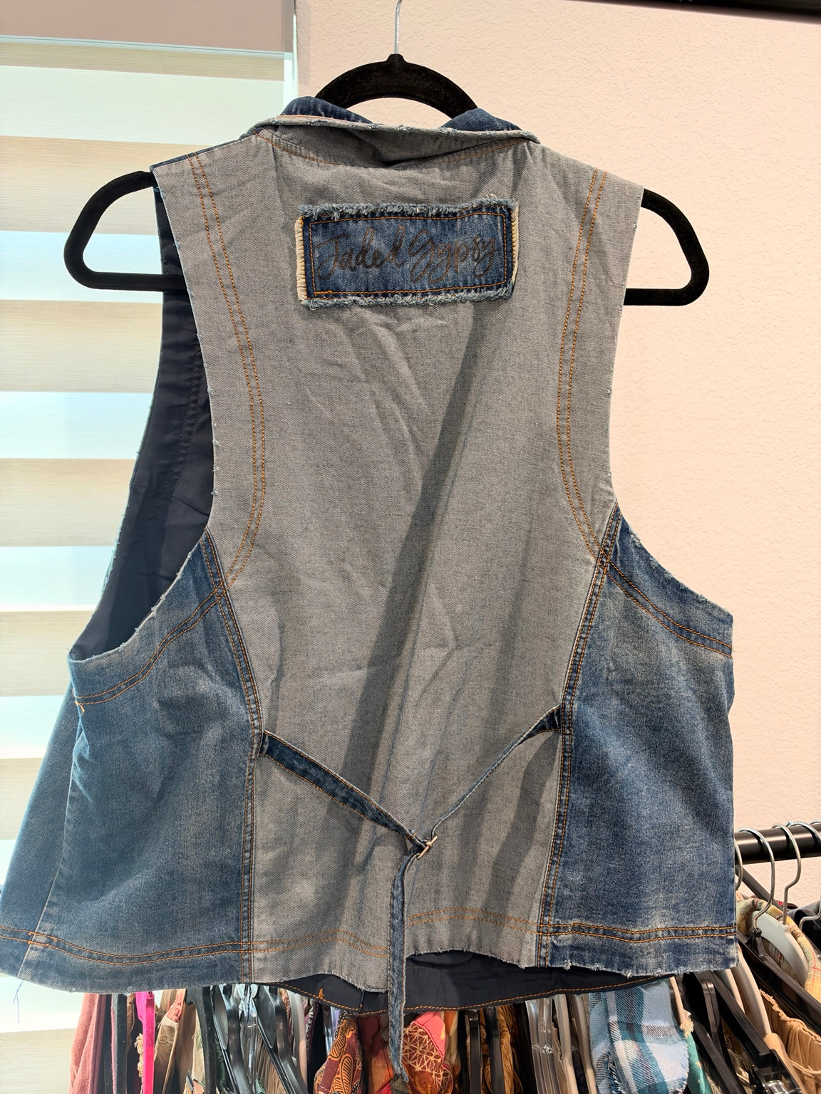 Back of Jaded Gypsy Spellbound Chambray Vest with contrasting panel and adjustable strap