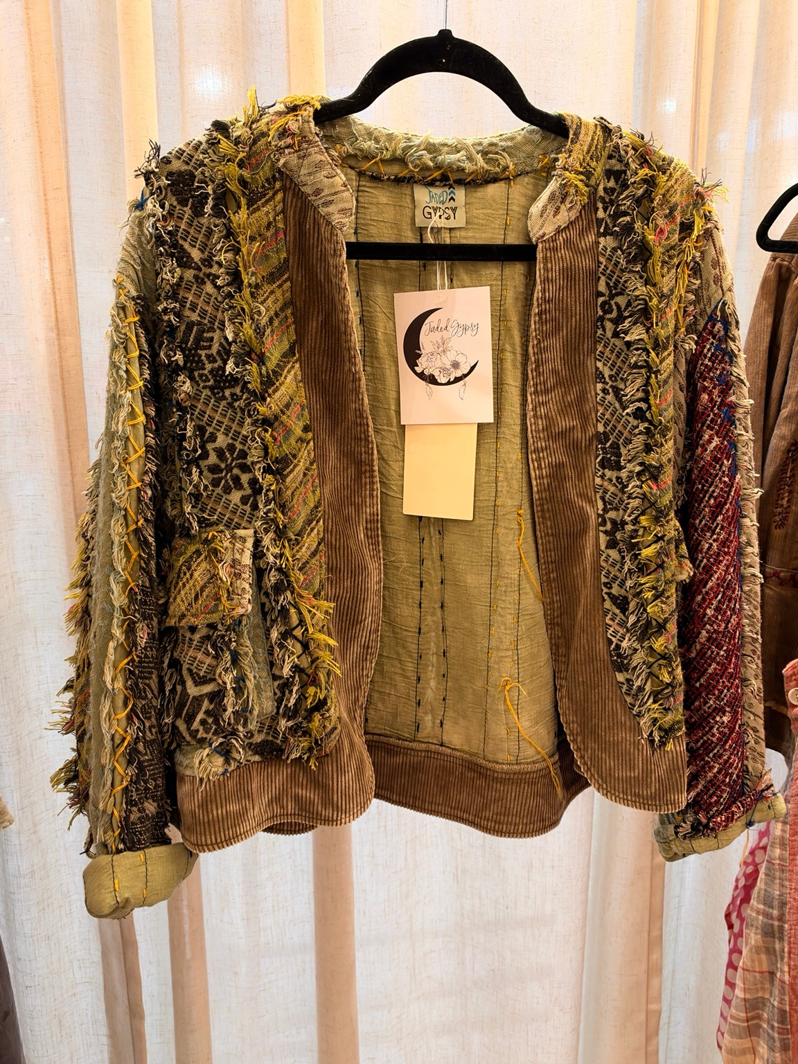 Wandering Petals Jacket in Olive with fringed patchwork, mixed patterns and contrasting textured trim